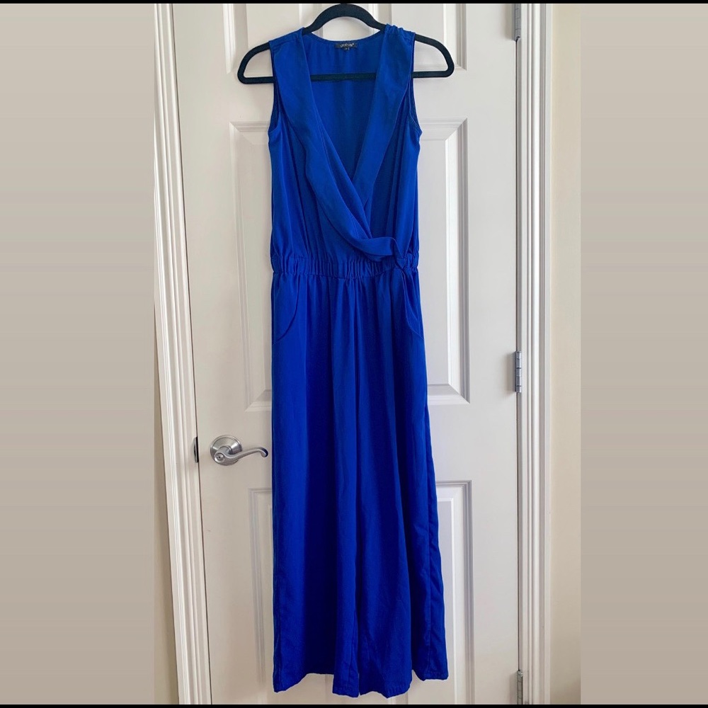 Electric blue jumpsuit with surplice neck